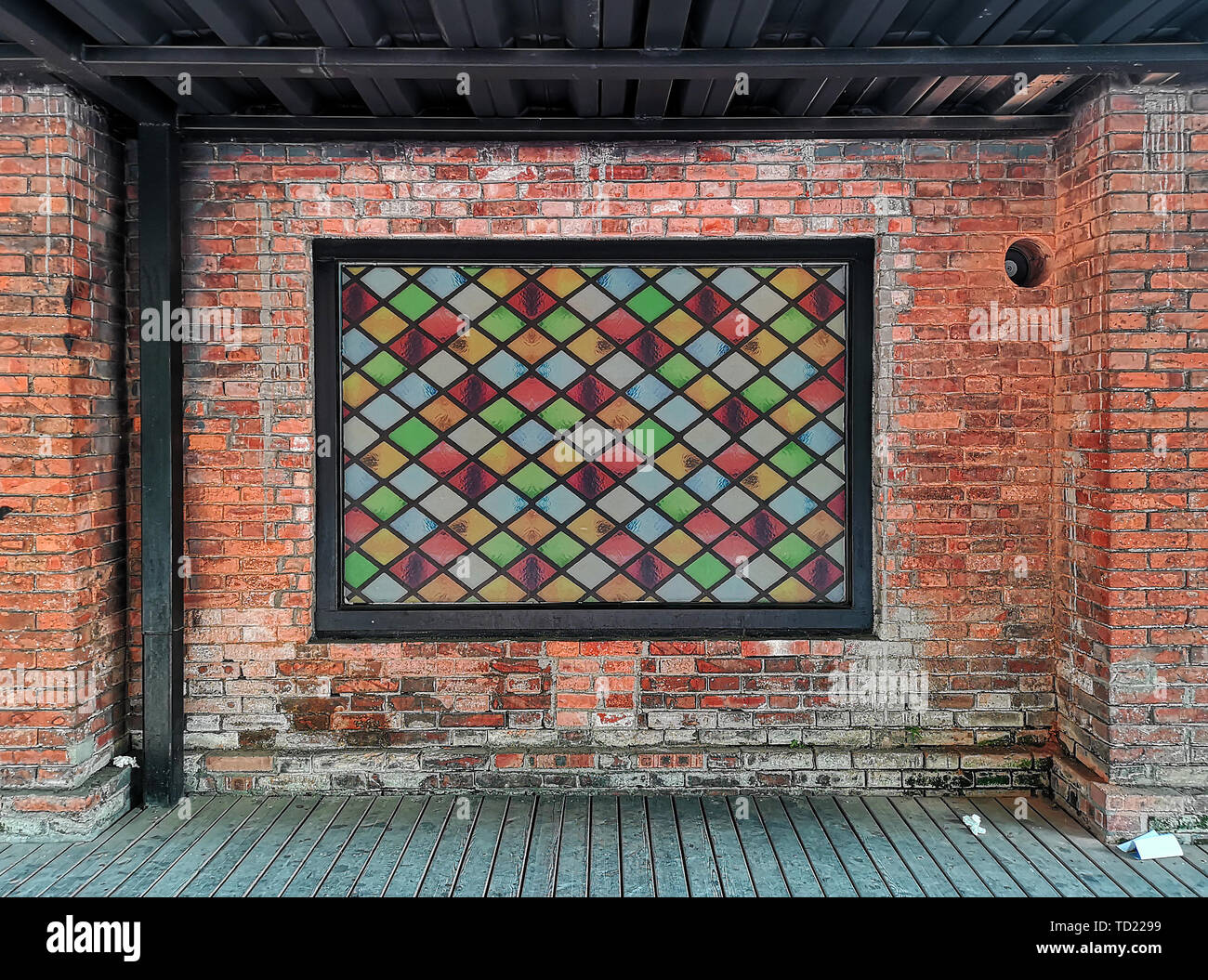 Brick wall and decorative frame background material Stock Photo - Alamy
