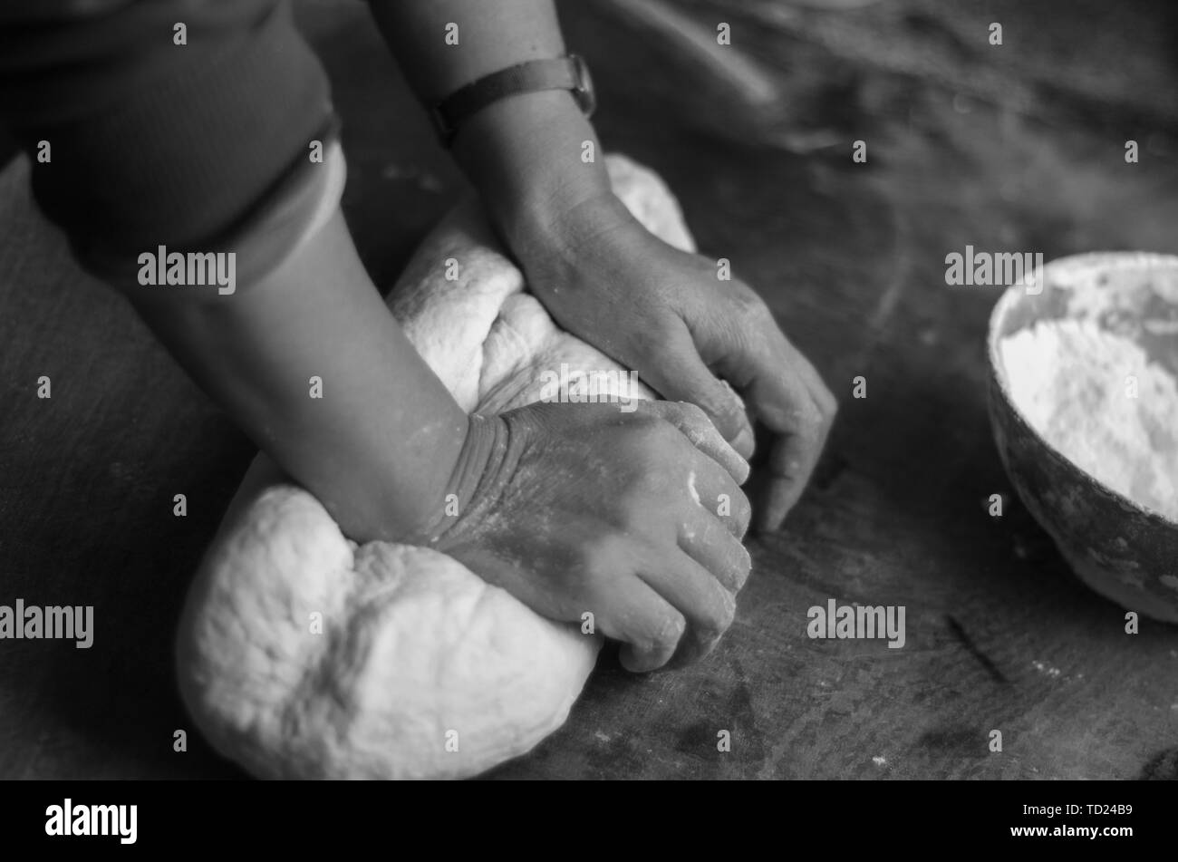 Knead black and white on the board. Stock Photo