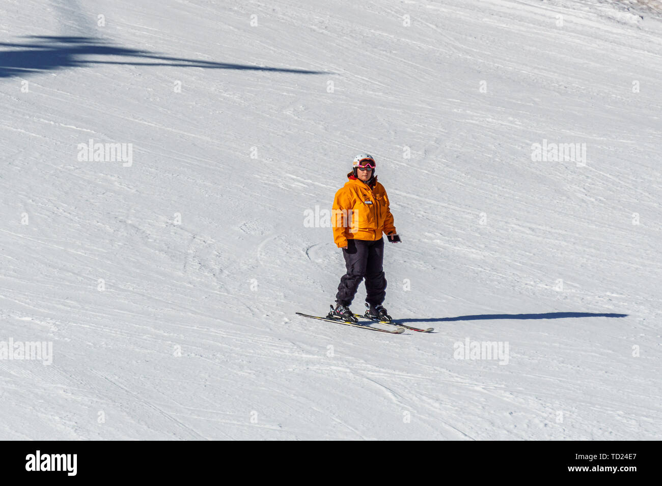 KIMBERLEY, CANADA - MARCH 22, 2019: Mountain Resort view early spring people skiing. Stock Photo