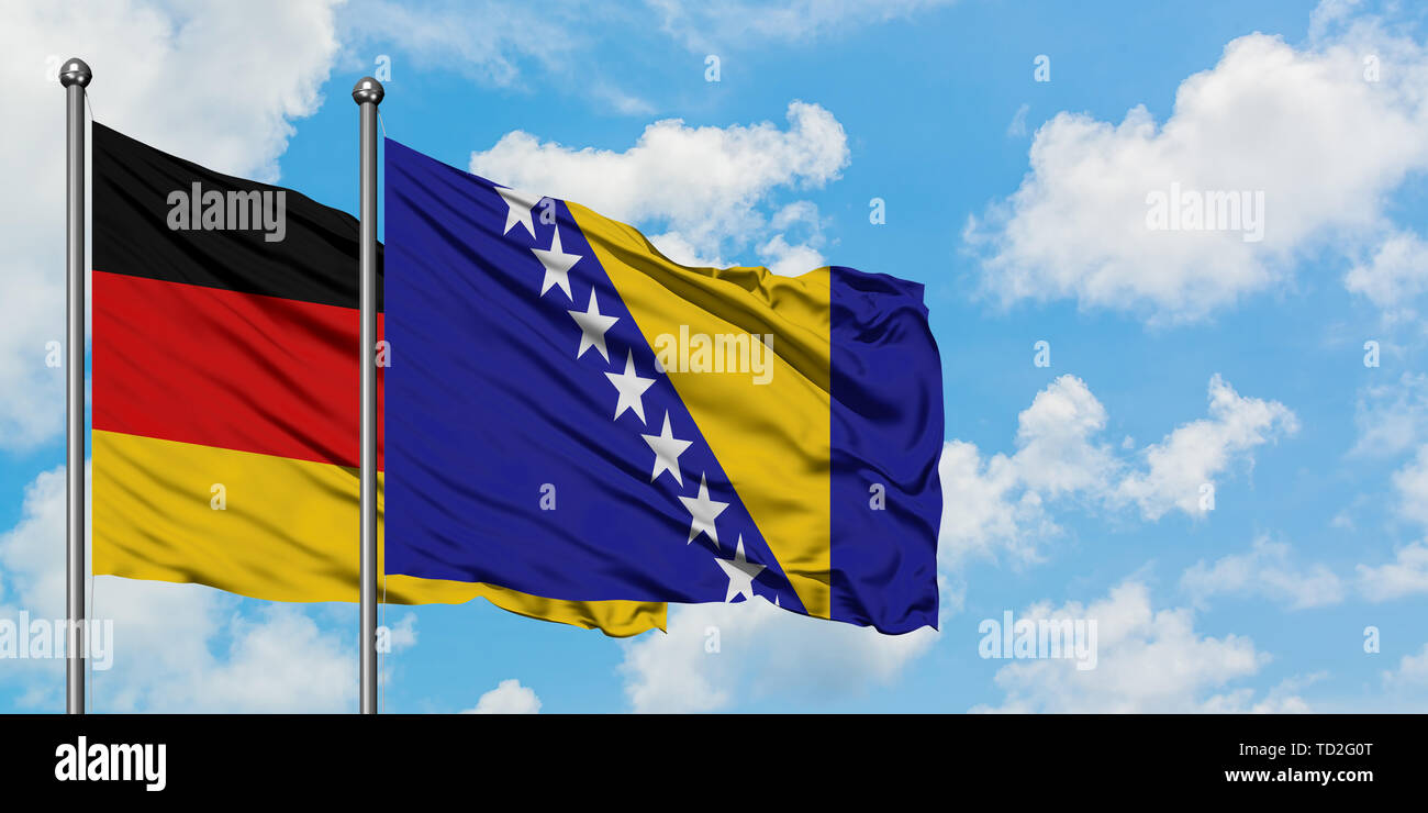 Germany and Bosnia Herzegovina flag waving in the wind against white ...