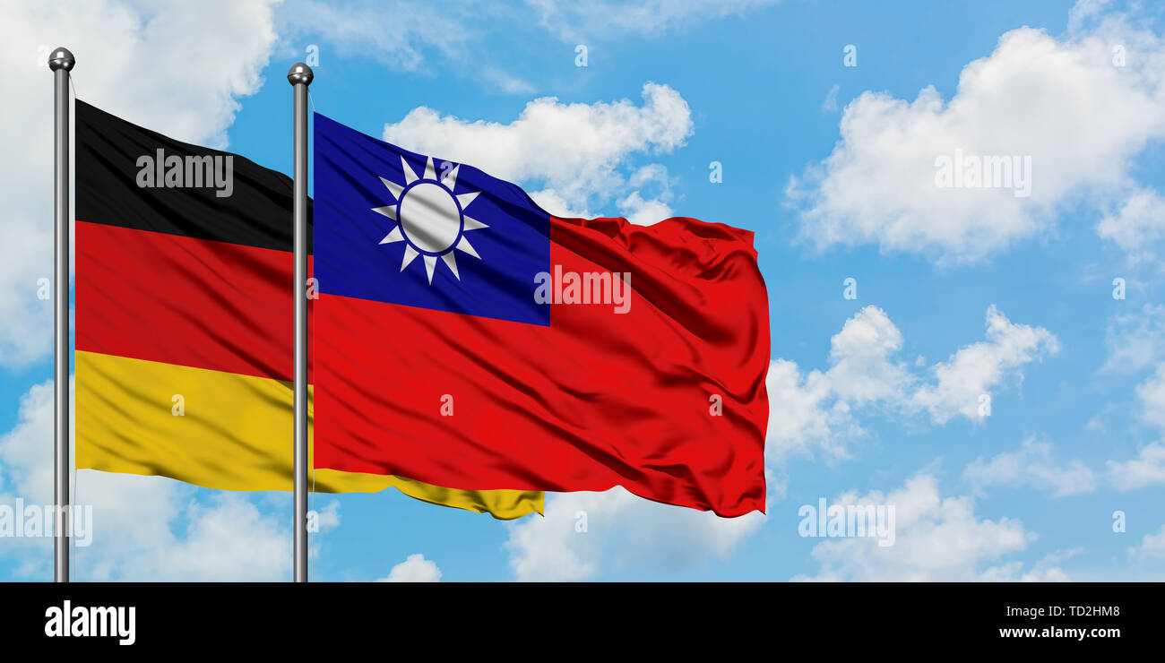 Germany and Taiwan flag waving in the wind against white cloudy blue sky  together. Diplomacy concept, international relations Stock Photo - Alamy