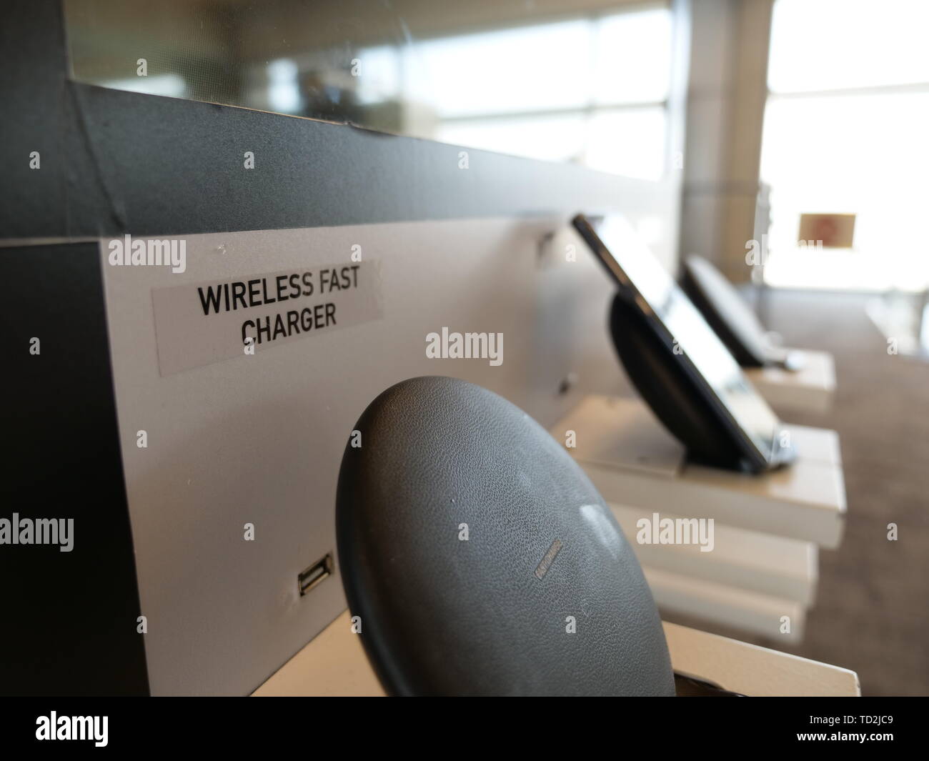 Wireless charging points at the airport Stock Photo Alamy