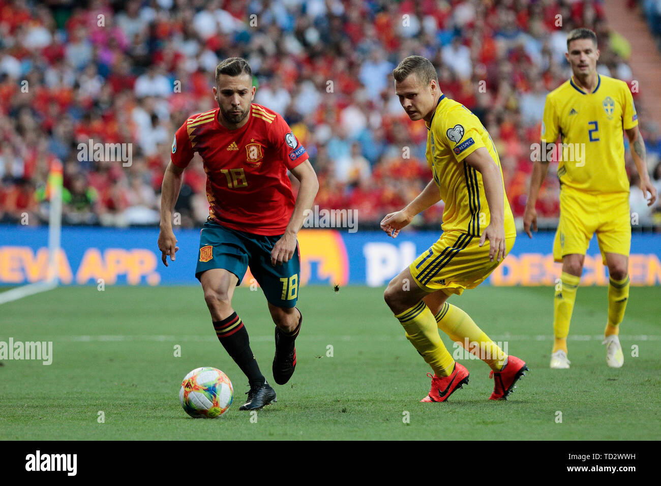 Spain national team player Jordi Alba and Sweden national team player Viktor Claesson seen in action during the UEFA EURO 2020 Qualifier match between Spain and Sweden at Santiago Bernabeu Stadium in Madrid. Final score: Spain 3 - Sweden 0 Stock Photo