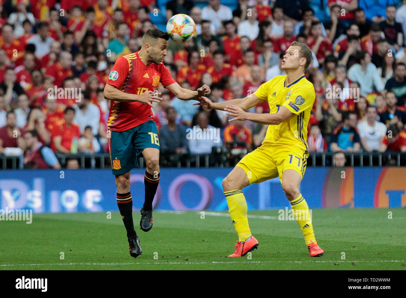 Spain national team player Jordi Alba and Sweden national team player Viktor Claesson seen in action during the UEFA EURO 2020 Qualifier match between Spain and Sweden at Santiago Bernabeu Stadium in Madrid. Final score: Spain 3 - Sweden 0 Stock Photo