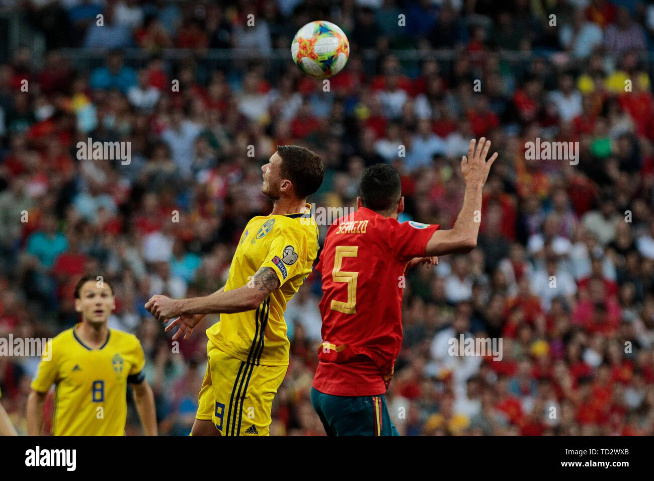 Spain national team player Sergio Busquets and Sweden national team player Marcus Berg seen in action during the UEFA EURO 2020 Qualifier match between Spain and Sweden at Santiago Bernabeu Stadium in Madrid. Final score: Spain 3 - Sweden 0 Stock Photo