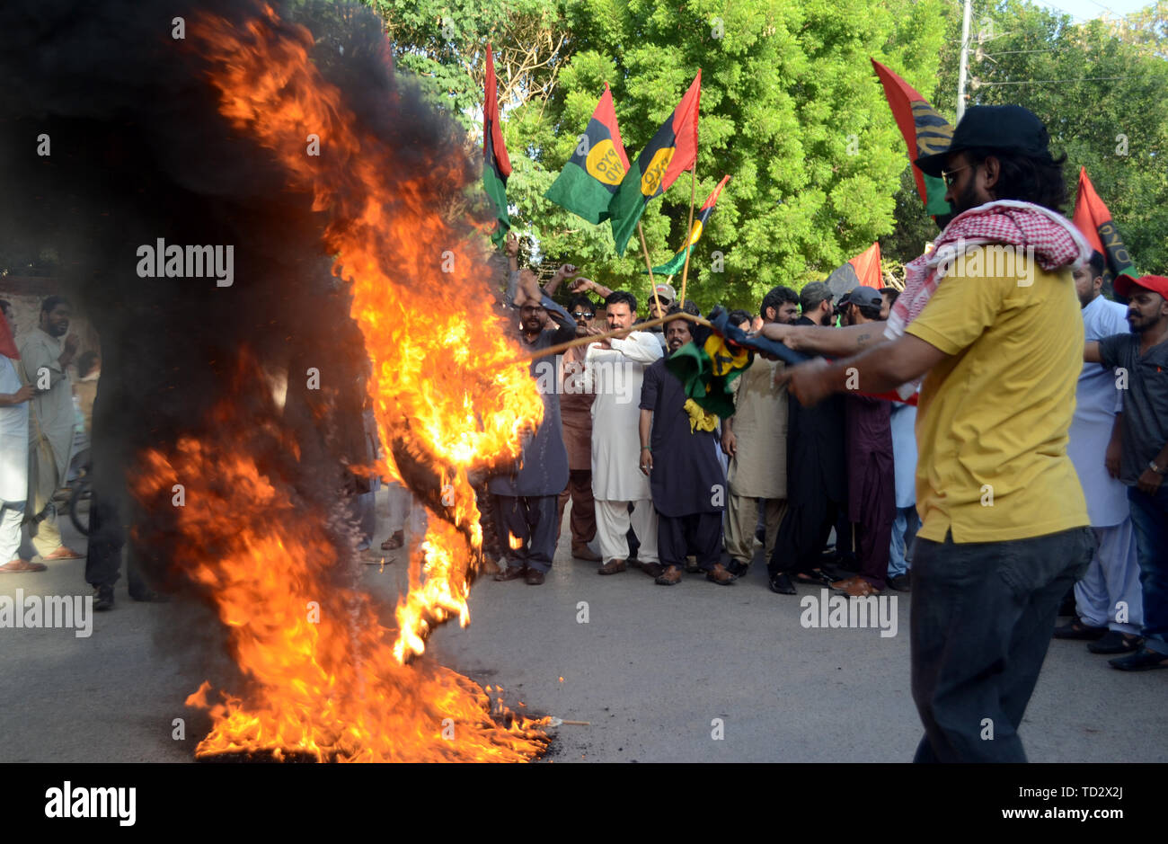 Hyderabad, Pakistan. 10th June, 2019. Activities of Pakistan Peoples Party PPP burns tires at court road near Hyderabad Press Club during the protest against the arrest of there co- party chairman Asif Ali Zardari by the NAB Islamabad. Credit: Jan Ali Laghari/ Pacific Press/Alamy Live News Stock Photo