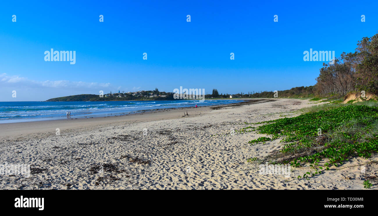 Panoramic landscape of Woolgoolga, Woolgoolga Headland and beach in New South Wales, Australia. People walking on the beach. Stock Photo