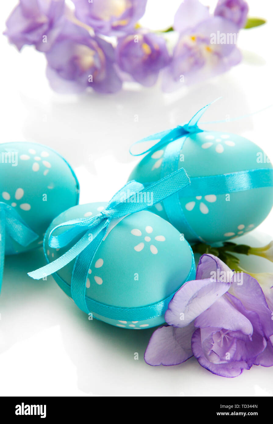 Bright easter eggs with bows and flowers, isolated on white Stock Photo ...