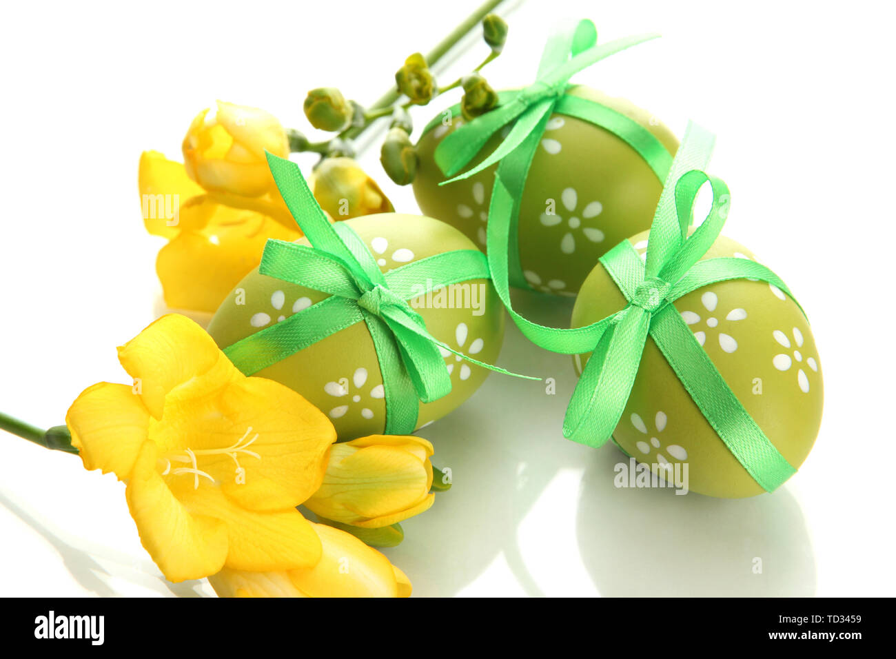 Bright easter eggs with bow and flowers, isolated on white Stock Photo ...