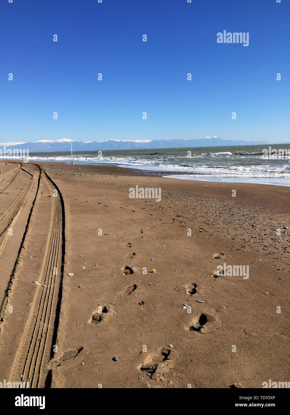 Footprints In The Sand At Sunset Beautiful Sandy Tropical Beach With Sea Waves Footsteps On