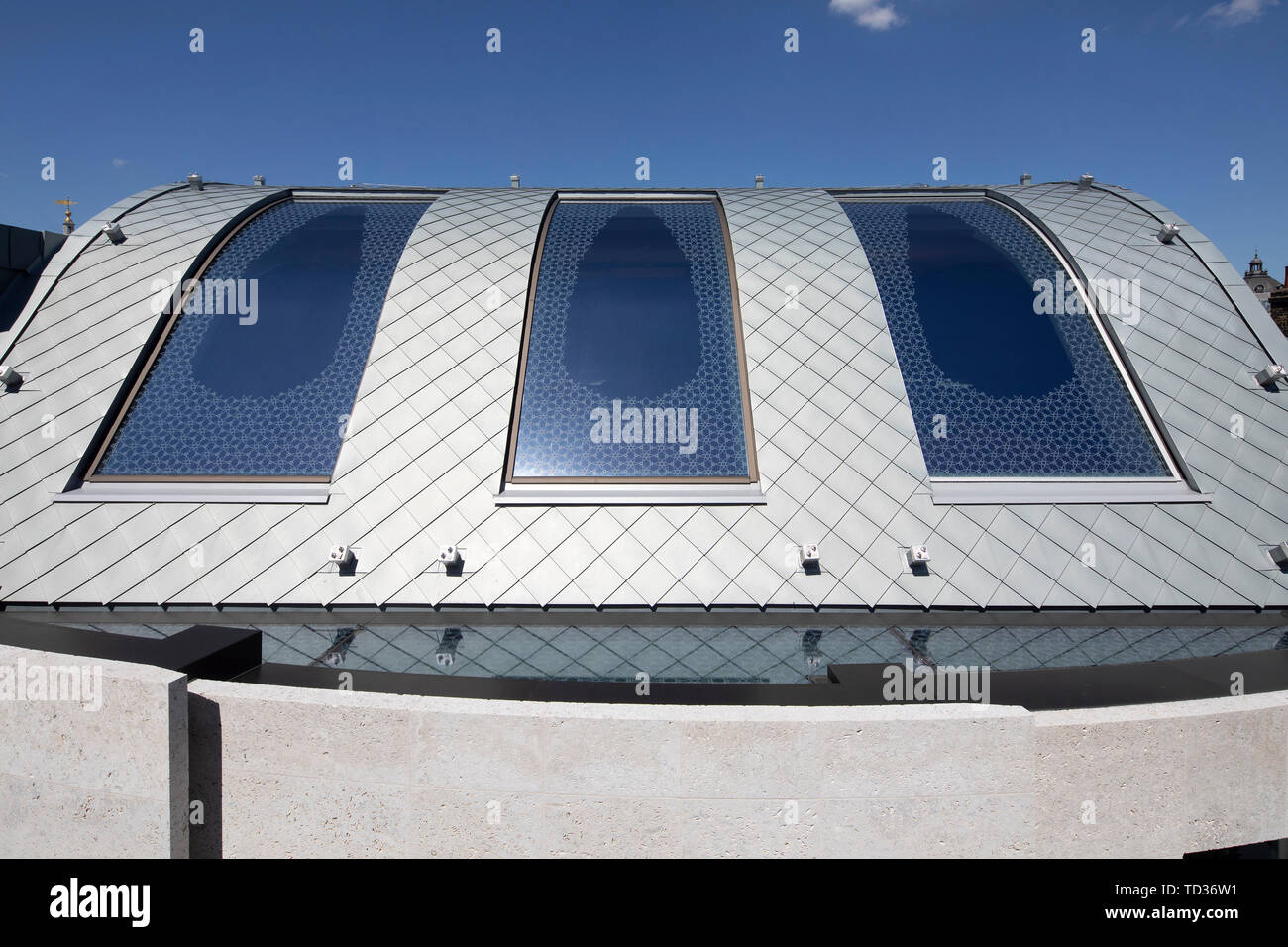 View of zinc shingle roof. Qatar Airways Headquarters, London, United