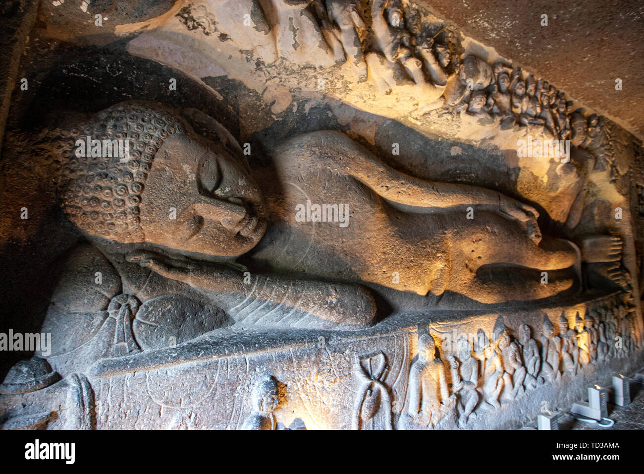 Cave 26's Mahaparinirvana — the exact sculpture referenced in the question, showing Buddha's final liberation