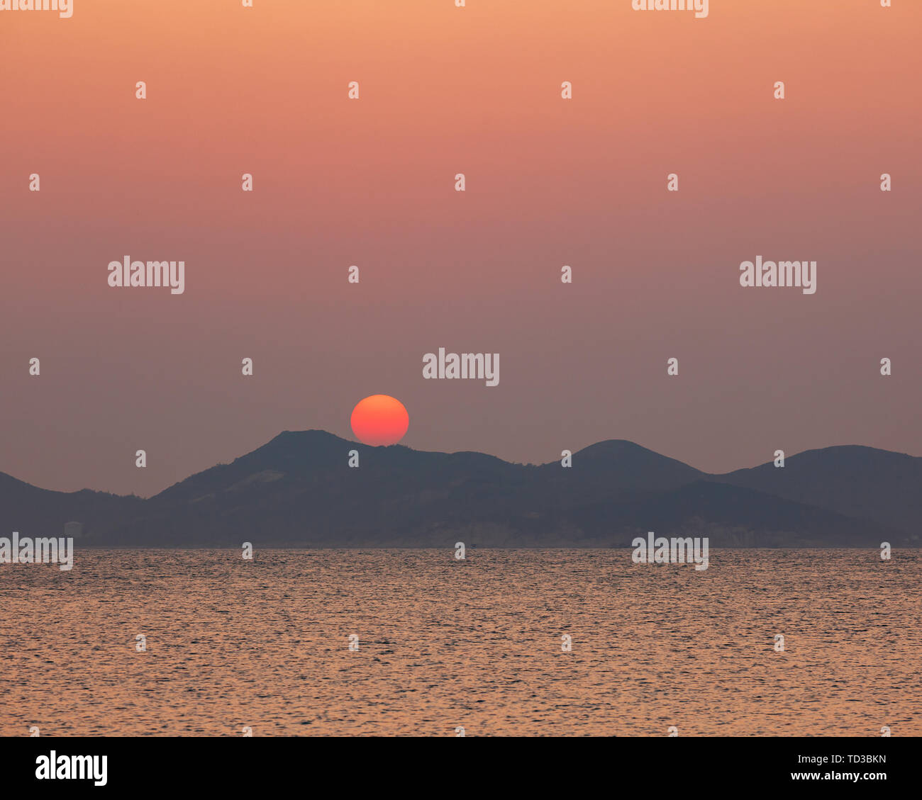Hilly Rifgle Sunset behind hill ridge Stock Photo - Alamy
