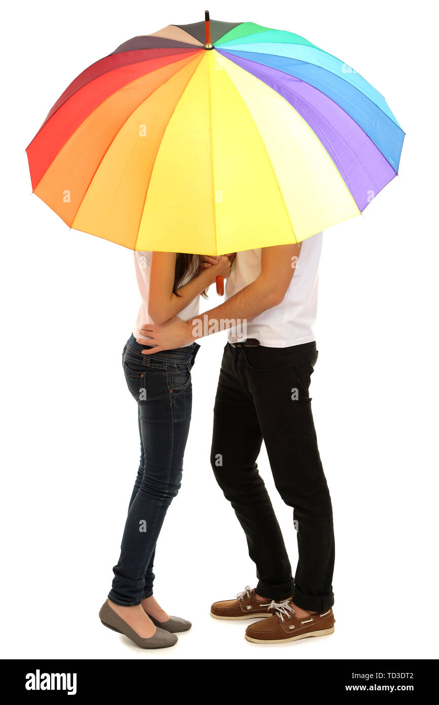 Loving couple standing with umbrella isolated on white Stock Photo - Alamy