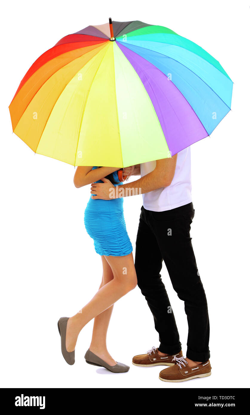 Loving couple standing with umbrella isolated on white Stock Photo - Alamy