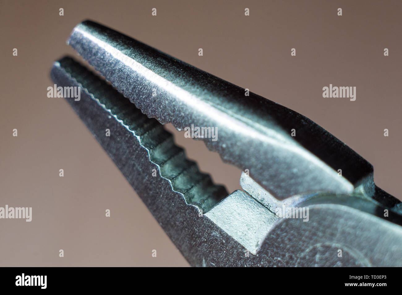elements small foldable steel multitool, closeup, macro Stock Photo