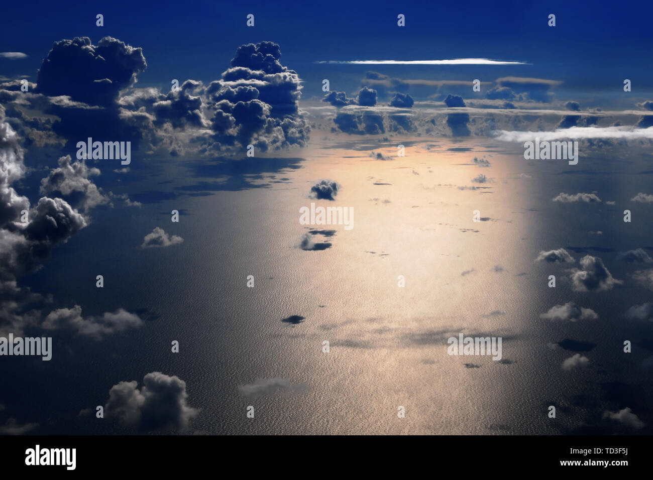 Aerial view of sea and cumulus clouds at night Stock Photo - Alamy