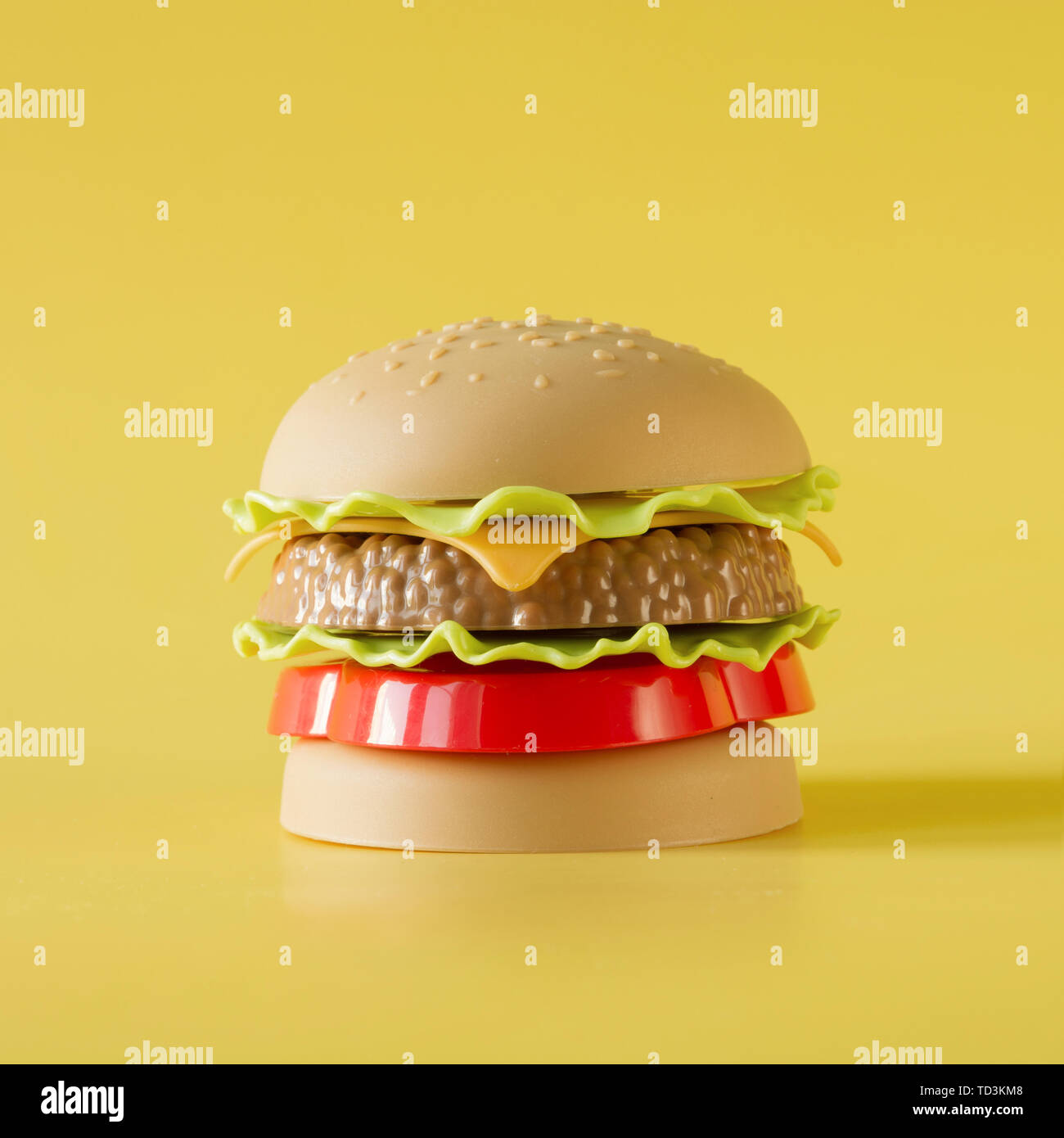 Download Plastic Burger Salad Tomato Meat With On Yellow Concept Of Harmful Artificial Food Plastic Stock Photo Alamy Yellowimages Mockups