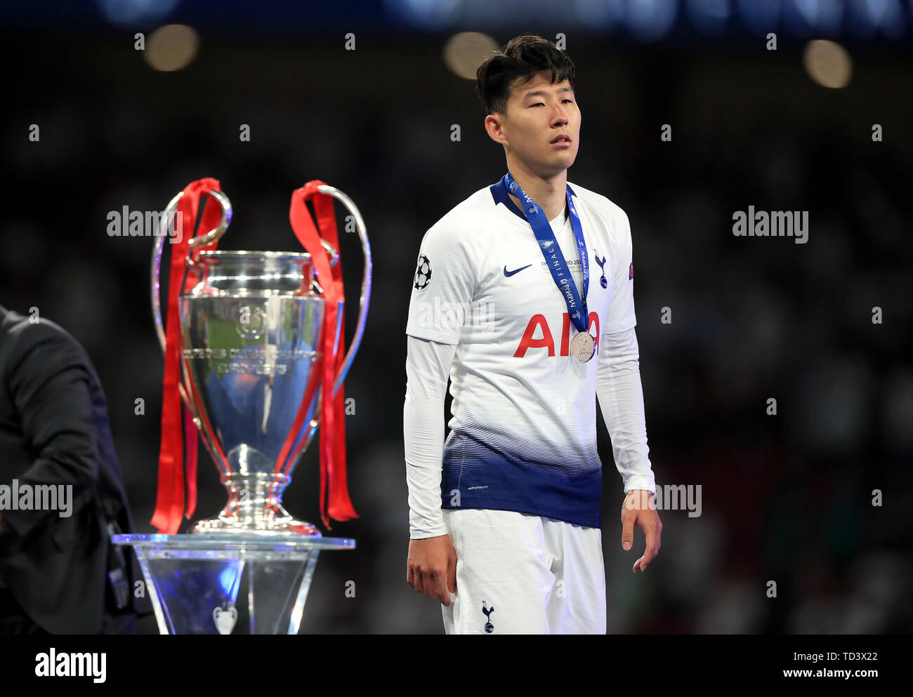 Tottenham Hotspur's Son Heung-min walks past the trophy after collecting  his runner's up medal after the UEFA Champions League Final at the Wanda  Metropolitano, Madrid Stock Photo - Alamy