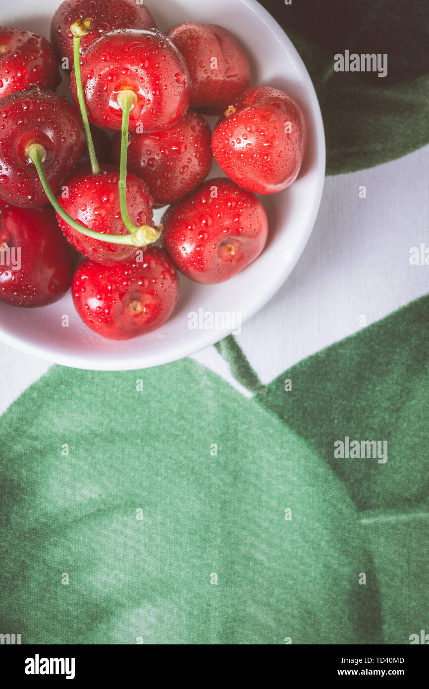 Organic Red Cherries with Fresh Water Drops as Summer and Healthy Eating Concept Stock Photo