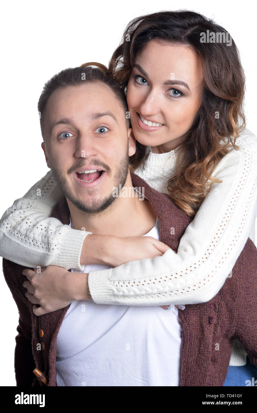 Happy young couple isolated on white background Stock Photo - Alamy