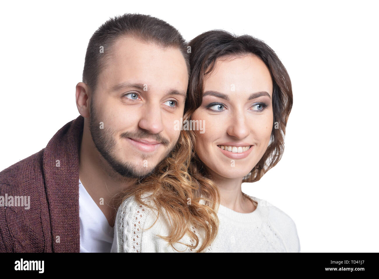 Happy young couple isolated on white background Stock Photo - Alamy