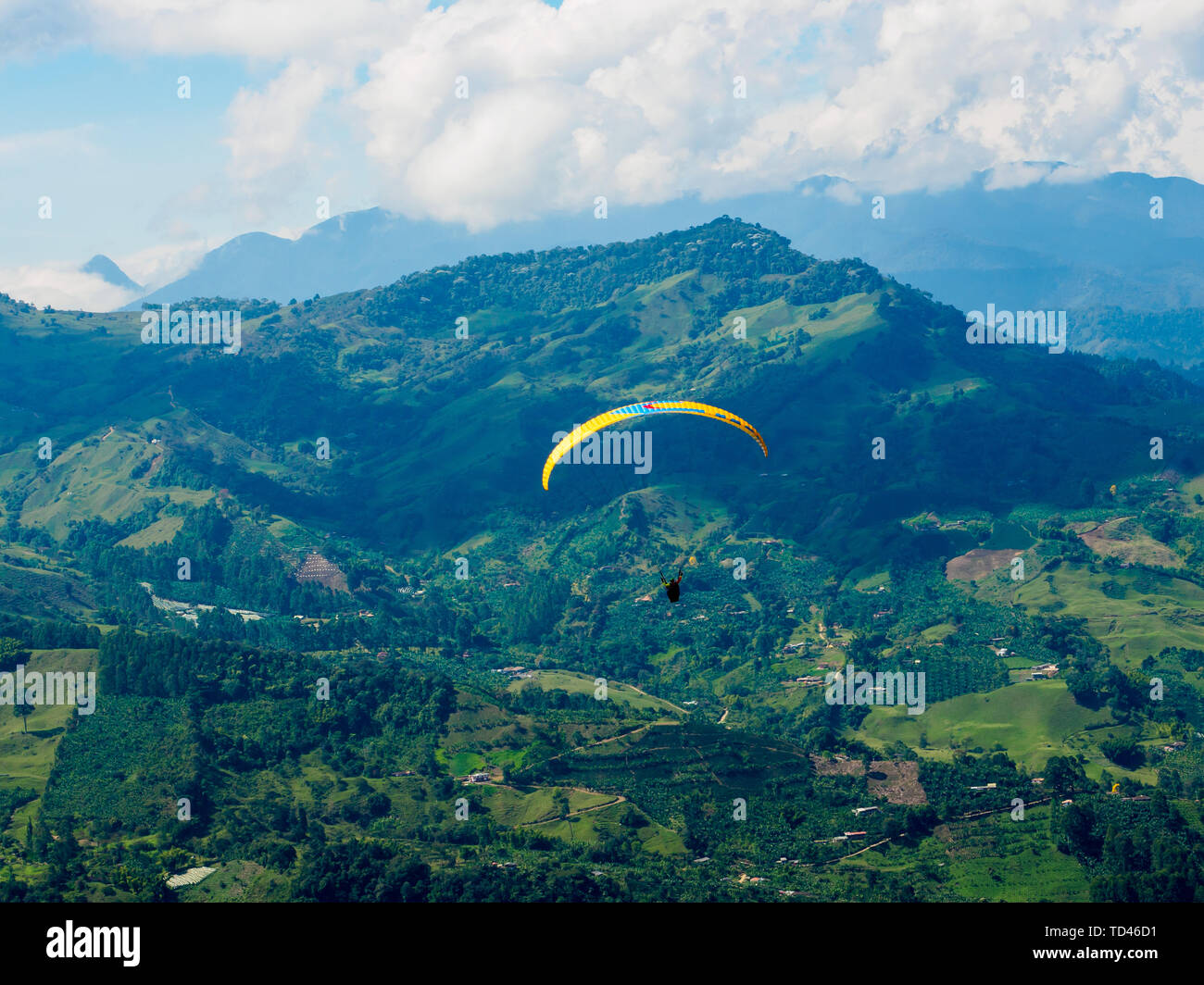 Paraglider soars near Jardin, Antioquia, Colombia, South America Stock Photo