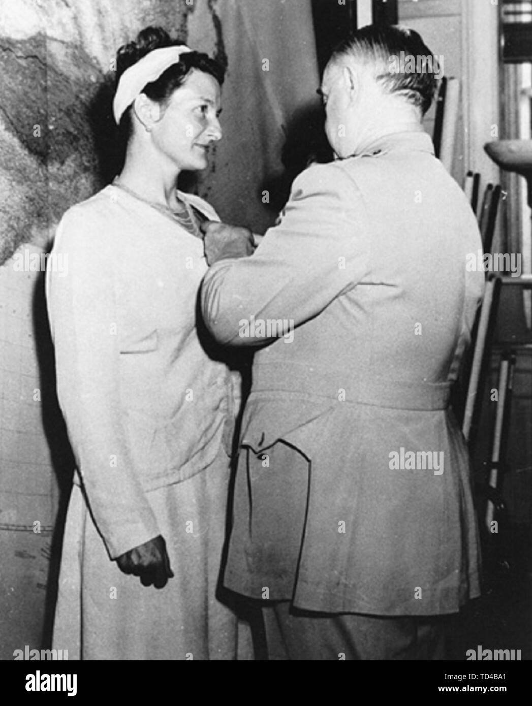 Virginia Hall of Special Operations Branch receiving the Distinguished Service Cross from General Donovan, September 1945. Virginia Hall Goillot (1906 – 1982) American spy with the British Special Operations Executive during World War II and later with the American Office of Strategic Services and the Special Activities Division of the Central Intelligence Agency. Stock Photo