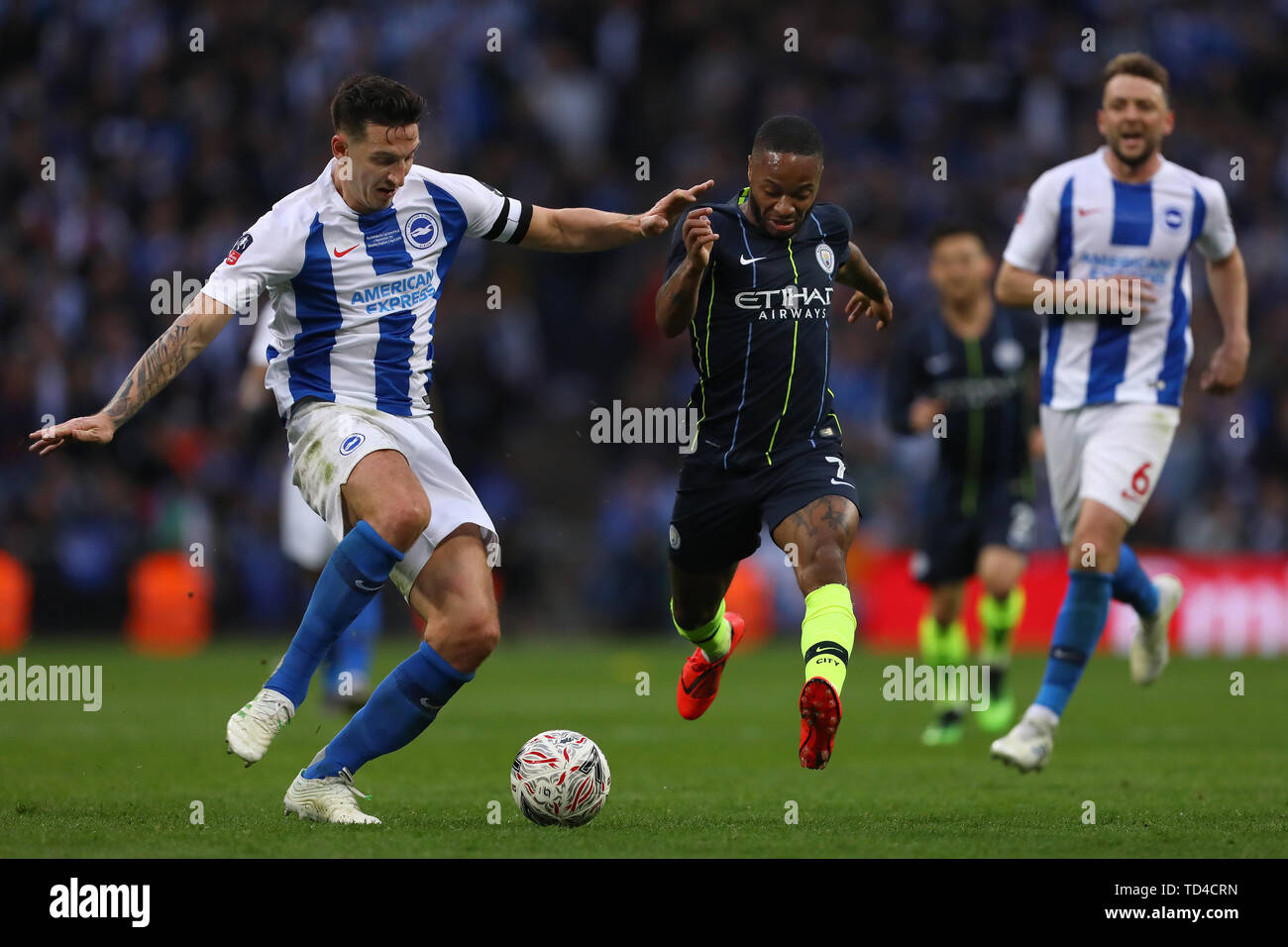 Raheem Sterling of Manchester City burst forward beating Lewis Dunk of Brighton & Hove Albion - Manchester City v Brighton & Hove Albion, The Emirates FA Cup Semi Final, Wembley Stadium, London - 6th April 2019  Editorial Use Only Stock Photo