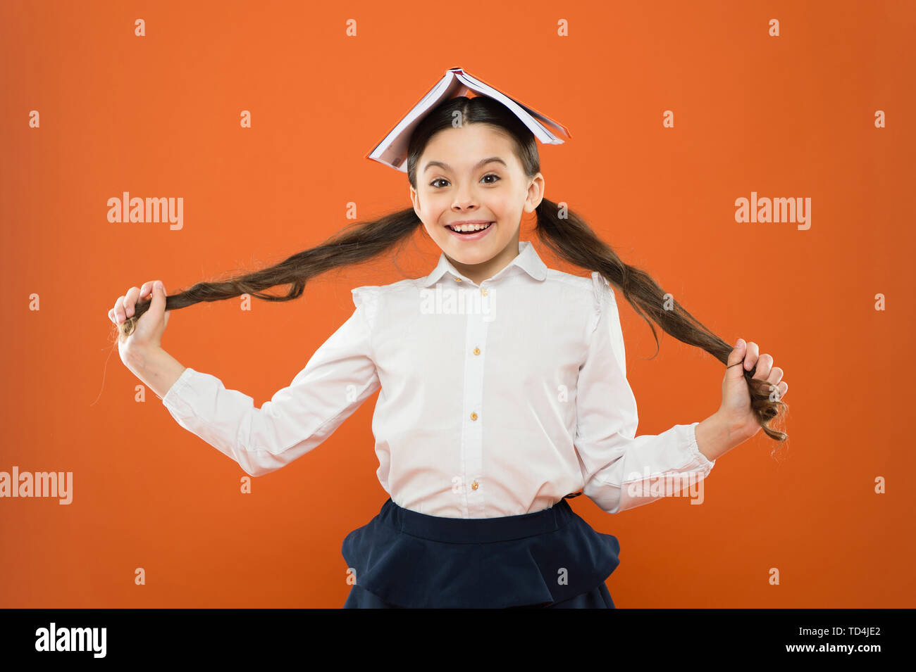 Let Your Hair Speak For Itself Cute Little Girl Holding Long