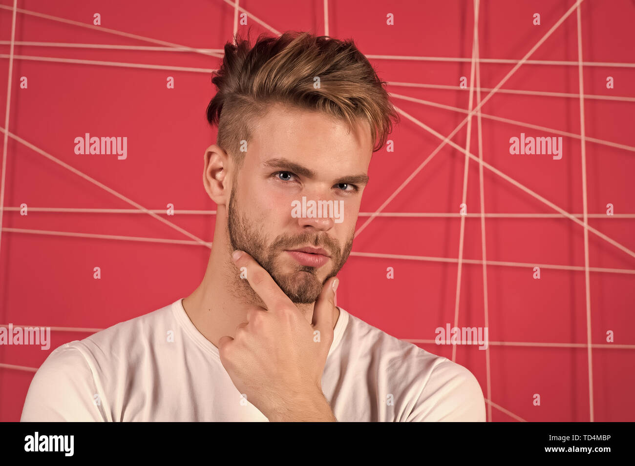 I find the ritual of shaving very relaxing. Handsome man touch beard hair.  Man needs shaving. Bearded man with short hair style. Style is a reflection  of my personality Stock Photo -