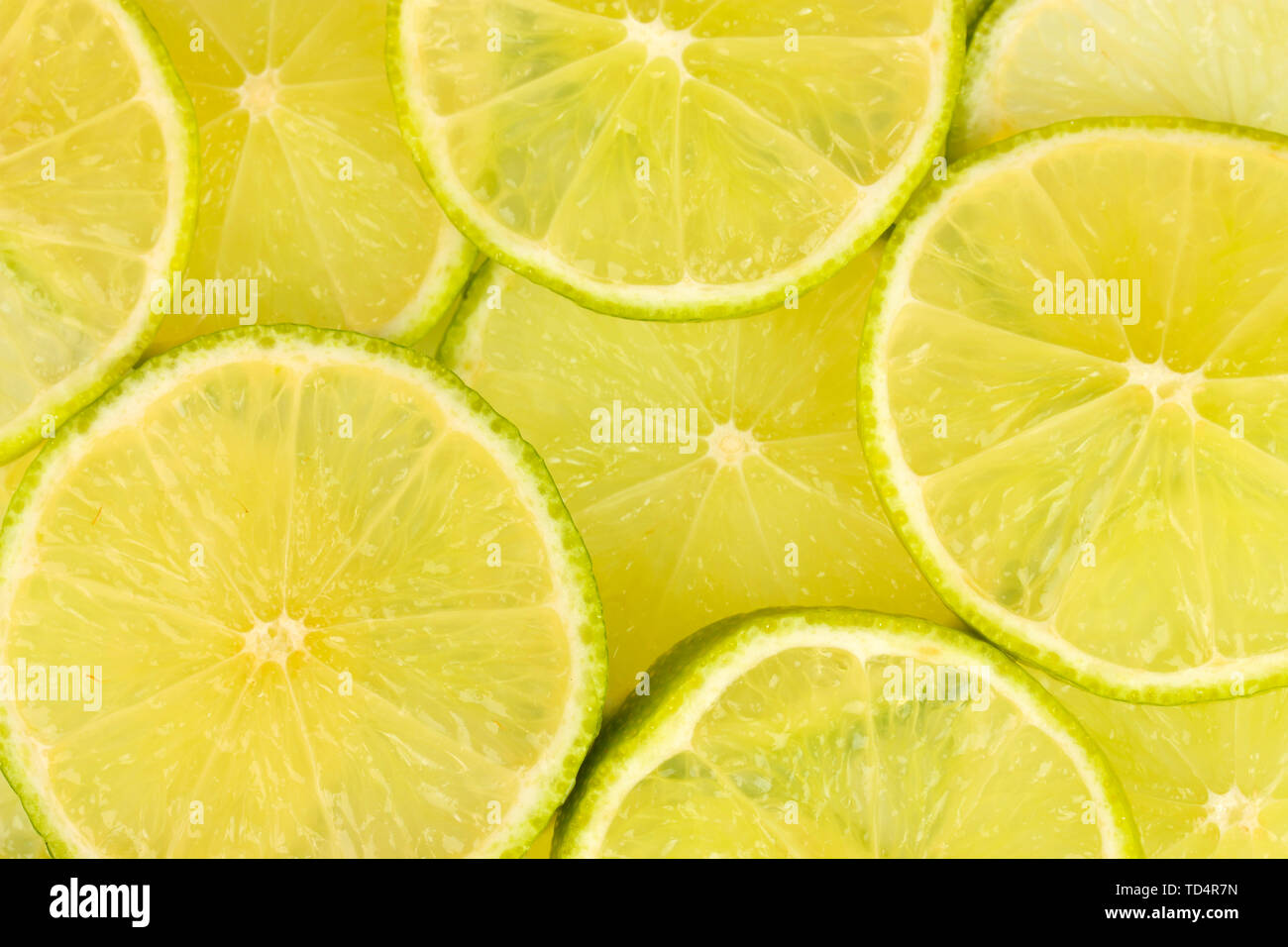 Lime slices background Stock Photo - Alamy