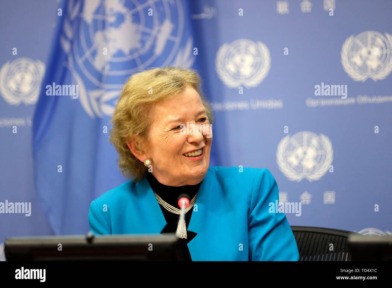 (190612) -- UNITED NATIONS, June 12, 2019 (Xinhua) -- Mary Robinson, chair of The Elders, reacts during a press briefing at the UN headquarters in New York, June 11, 2019. Mary Robinson warned on Tuesday against a nuclear fiasco, as due attention is not being paid to the issue. 'We are nearer to the Doomsday Clock (midnight) than we have ever been, and yet somehow it is not an issue that has taken hold in people's sense of what are the pending crises in our world,' she said, referring to a symbol that represents the likelihood of a man-made global catastrophe. (Xinhua/Li Muzi) Stock Photo