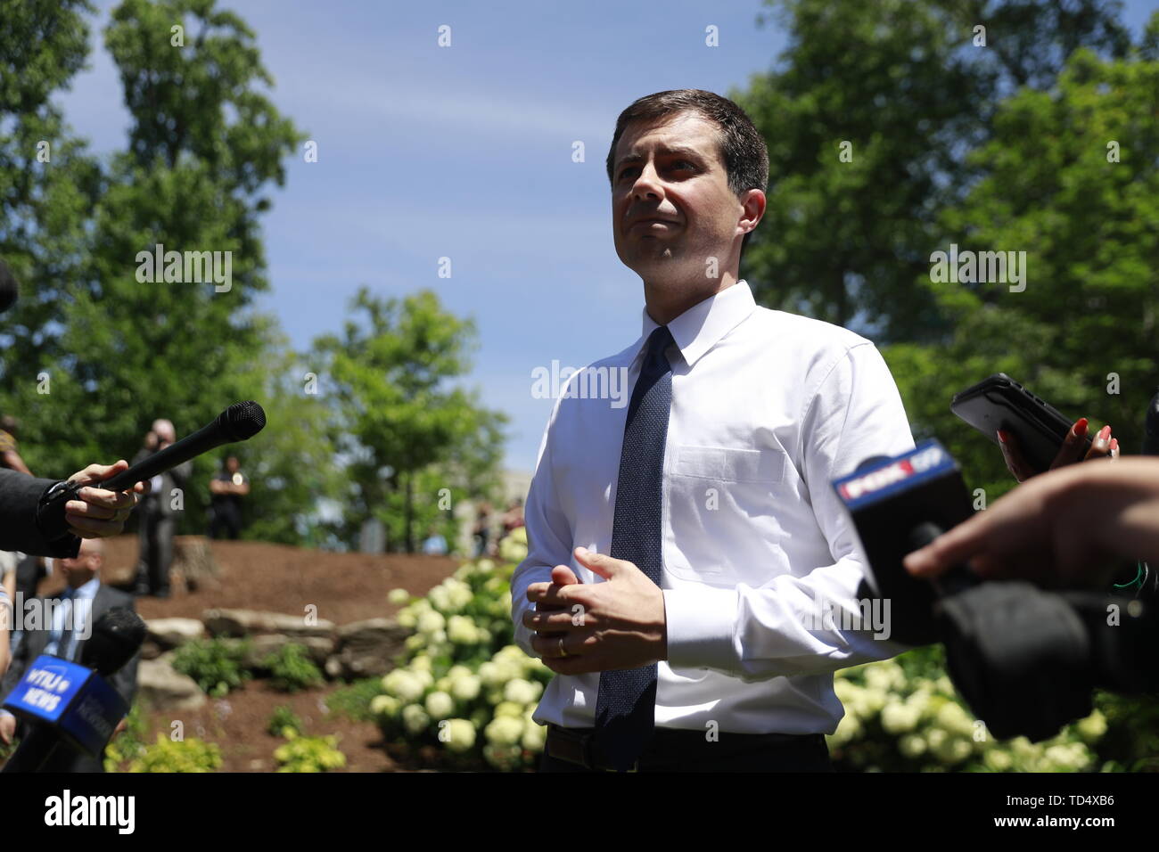 Bloomington, United States. 11th June, 2019. South Bend Mayor Pete Buttigieg, who is running for the Democratic nomination for President of the United States answers question during a press gaggle after delivering an hour long speech on foreign policy and security at the Indiana University Auditorium in Bloomington. Credit: SOPA Images Limited/Alamy Live News Stock Photo