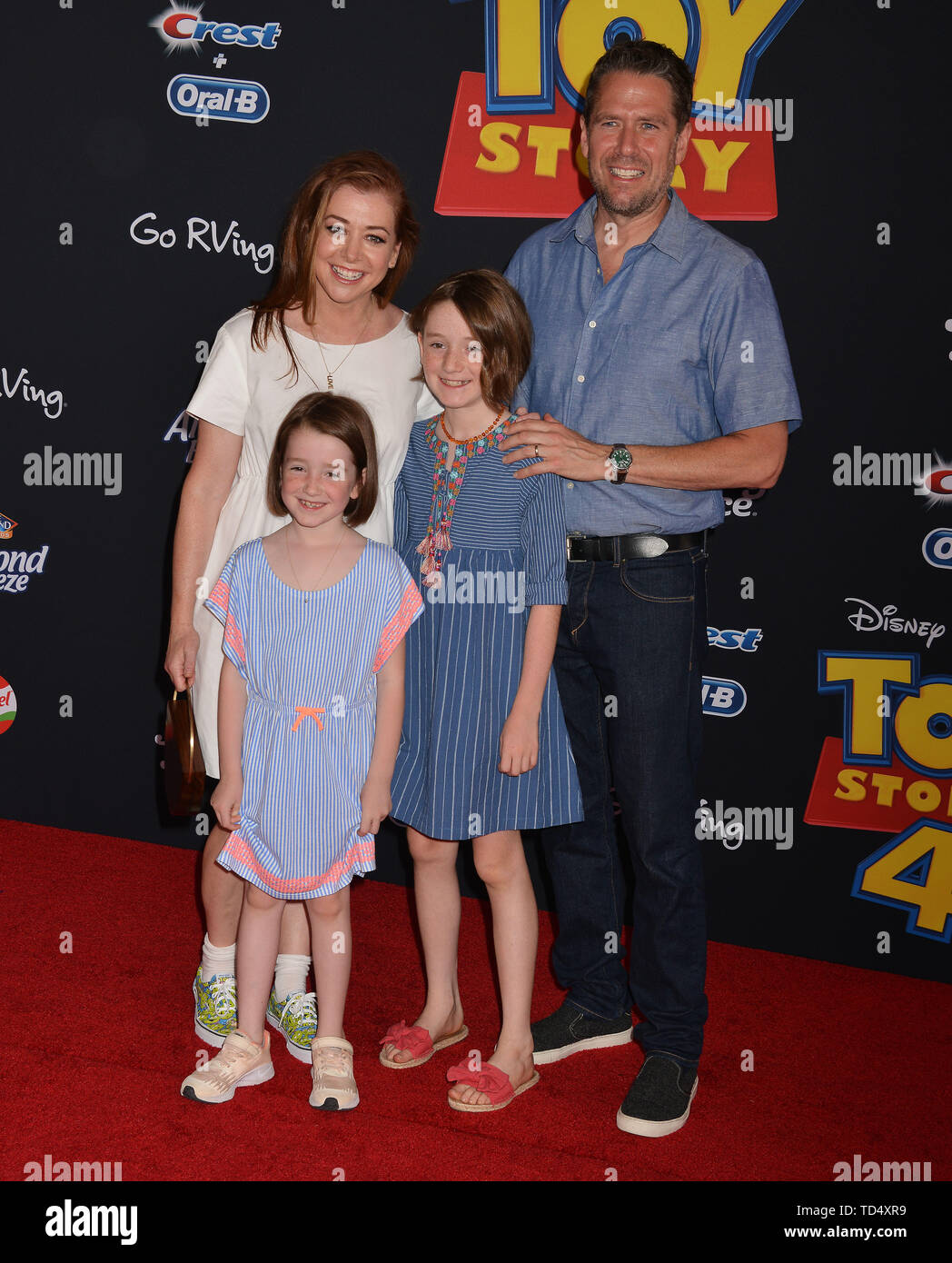 Los Angeles, USA. 11th June, 2019. Alyson Hannigan, Alexis Denisof, Saty,  Keeva arrives at the premiere of Disney and Pixar's "Toy Story 4" on June  11, 2019 in Los Angeles, California. Credit: