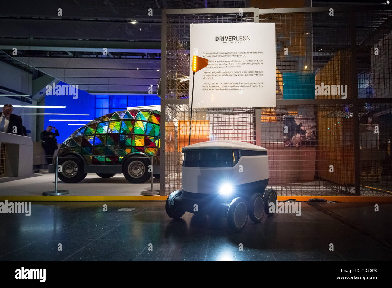 London, UK. 12th June 2019. Driverless technology 'Who is in control?' exhibition is launched the Science Museum. Pictured (centre): Starship Delivery Robot – currently in use and aiming to revolutionise food and package deliveries. Pictured Left: 'Stained Glass Driverless Sleeper Car of the Future' designed by artist Dominic Wilcox. Exploring the history of self-driving vehicles, the exhibition also examines how much control we're willing to transfer to them and how their wider deployment could shape out habits, behaviour and society. Credit: Guy Corbishley/Alamy Live News Stock Photo