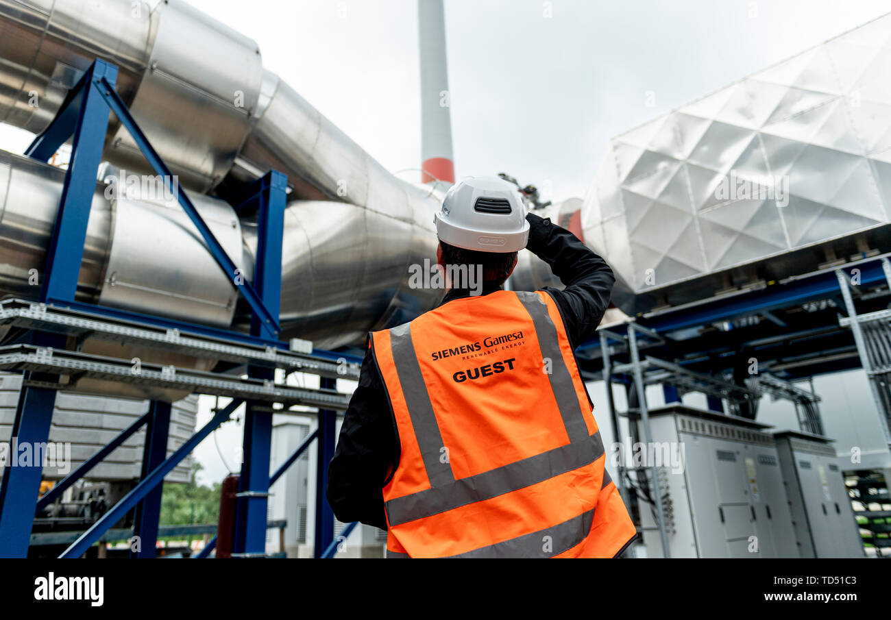 Hamburg, Germany. 12th June, 2019. A worker is testing an
