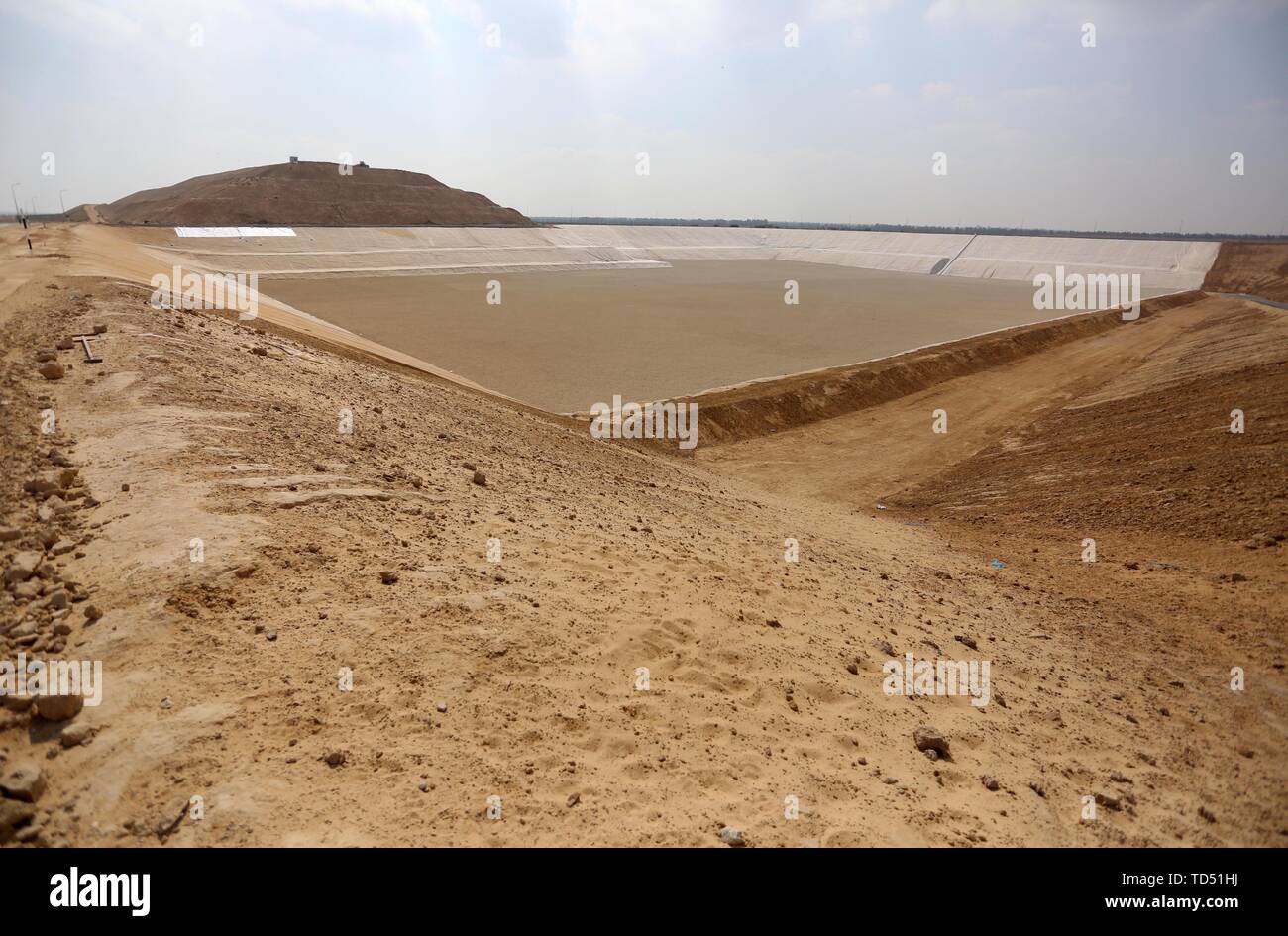 June 11, 2019 - Khan Younis, Gaza Strip, Palestinian Territory - The general view show Al-Fukhari 'Sofa'' Landfill in Khan younis in the southern, on June 12, 2019. The Gaza SWMP is a multi-donor funded project of US$ 35 million. The design was financed by a generous grant from the Islamic Development Bank (IsDB) and the implementation is financed by a pool of grants from the World Bank, the EU and France. A small grant is also provided from the Multi-Donor Trust Fund for Infrastructure administered by the World Bank. It is a comprehensive strategic infrastructure and capacity building proj Stock Photo