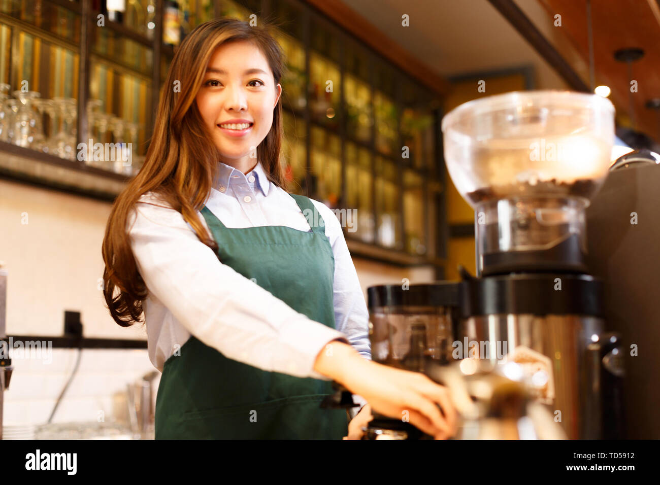 Make Waiters Make it waitress and waiter in cafe Stock Photo - Alamy