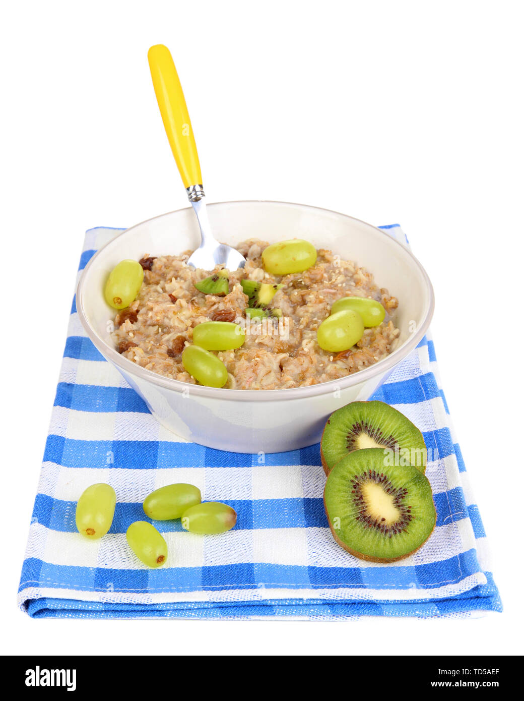 Useful oatmeal in bowl with fruit isolated on white Stock Photo - Alamy