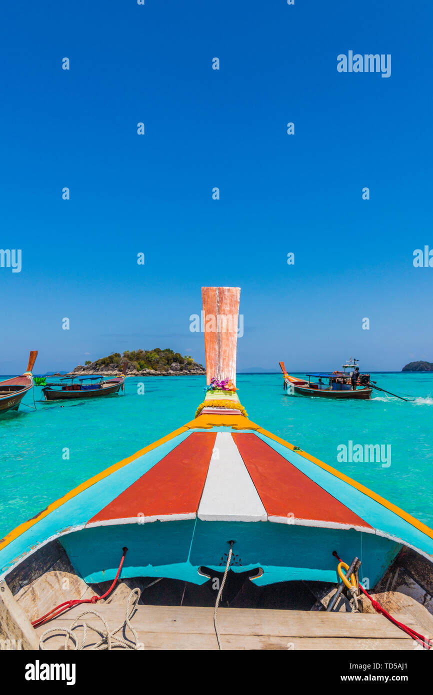 A colourful long tail boat on Ko Lipe Island in Tarutao National Marine Park, Thailand, Southeast Asia, Asia Stock Photo