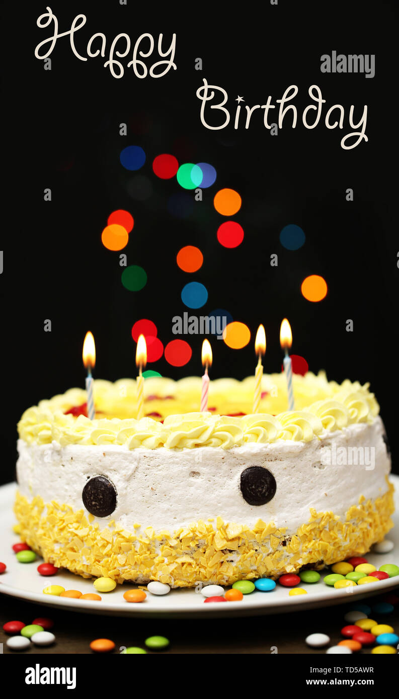 Happy birthday cake, on black background Stock Photo - Alamy