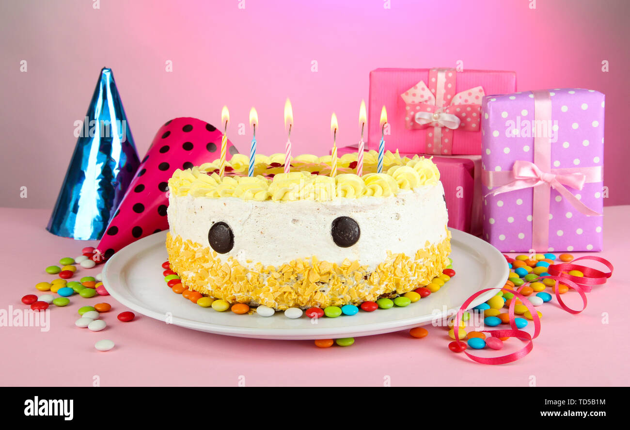 Happy Birthday Cake And Gifts On Pink Background Stock Photo