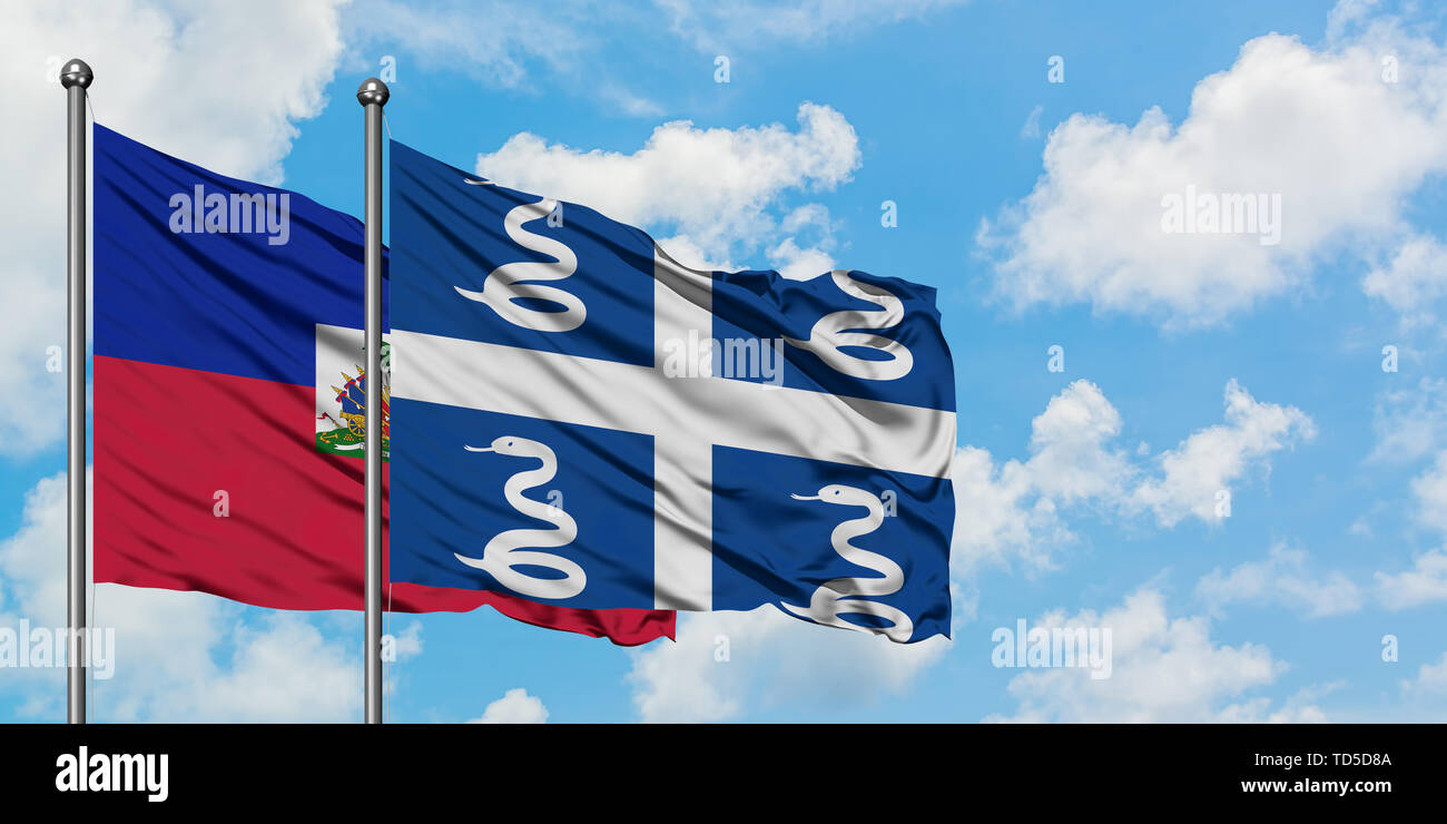 Haiti and Martinique flag waving in the wind against white cloudy blue sky  together. Diplomacy concept, international relations Stock Photo - Alamy