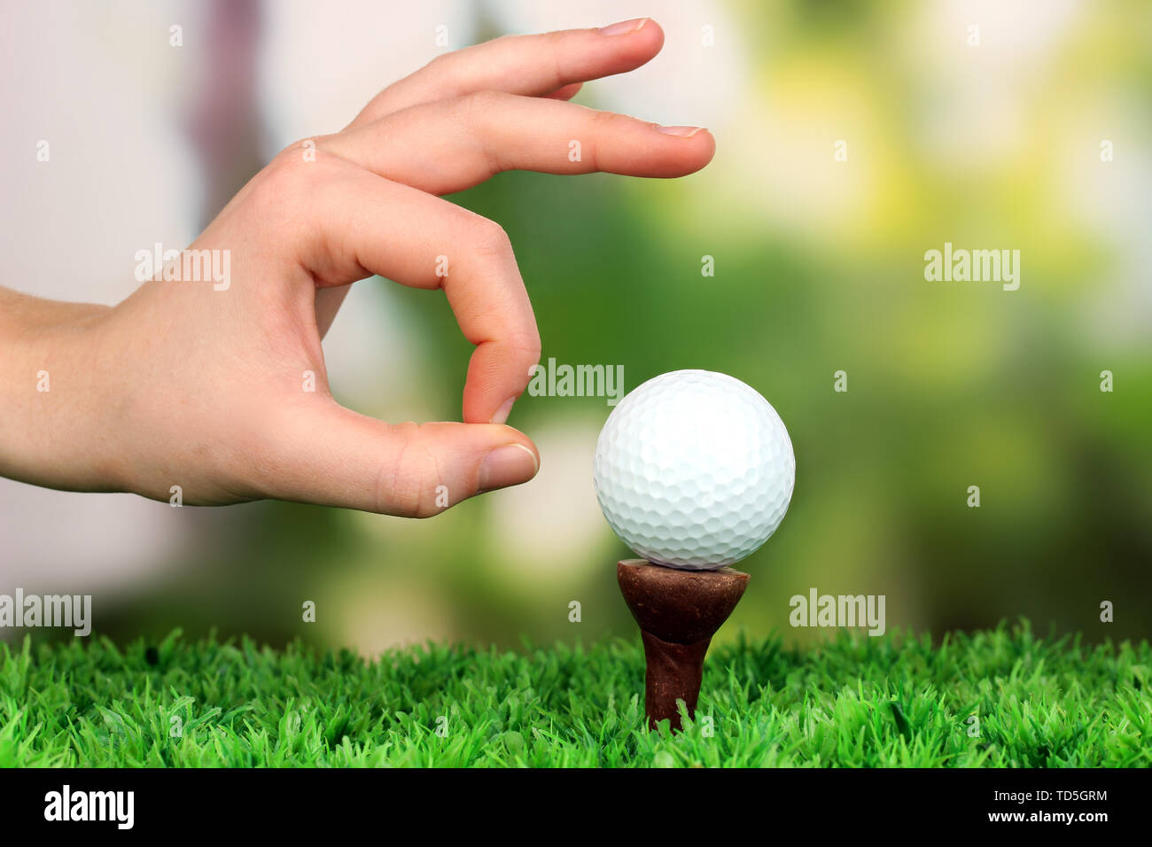Pushing golf ball hires stock photography and images Alamy