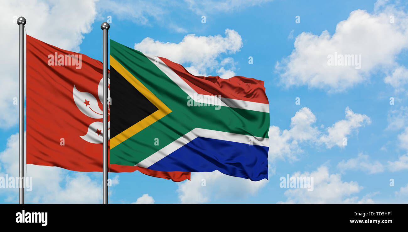 Hong Kong and South Africa flag waving in the wind against white cloudy