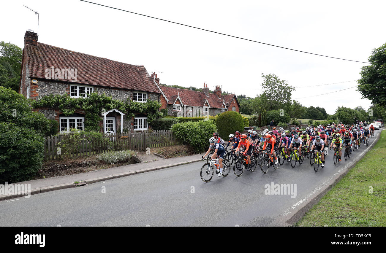 The peloton pass through the village of Middle Assendon in South Oxfordshire during stage three the OVO Energy Women's Tour. Stock Photo