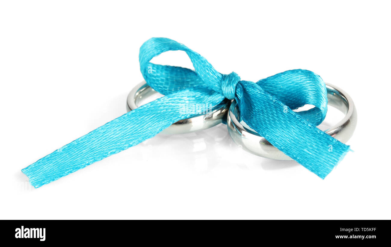 Wedding rings tied with ribbon isolated on white Stock Photo - Alamy