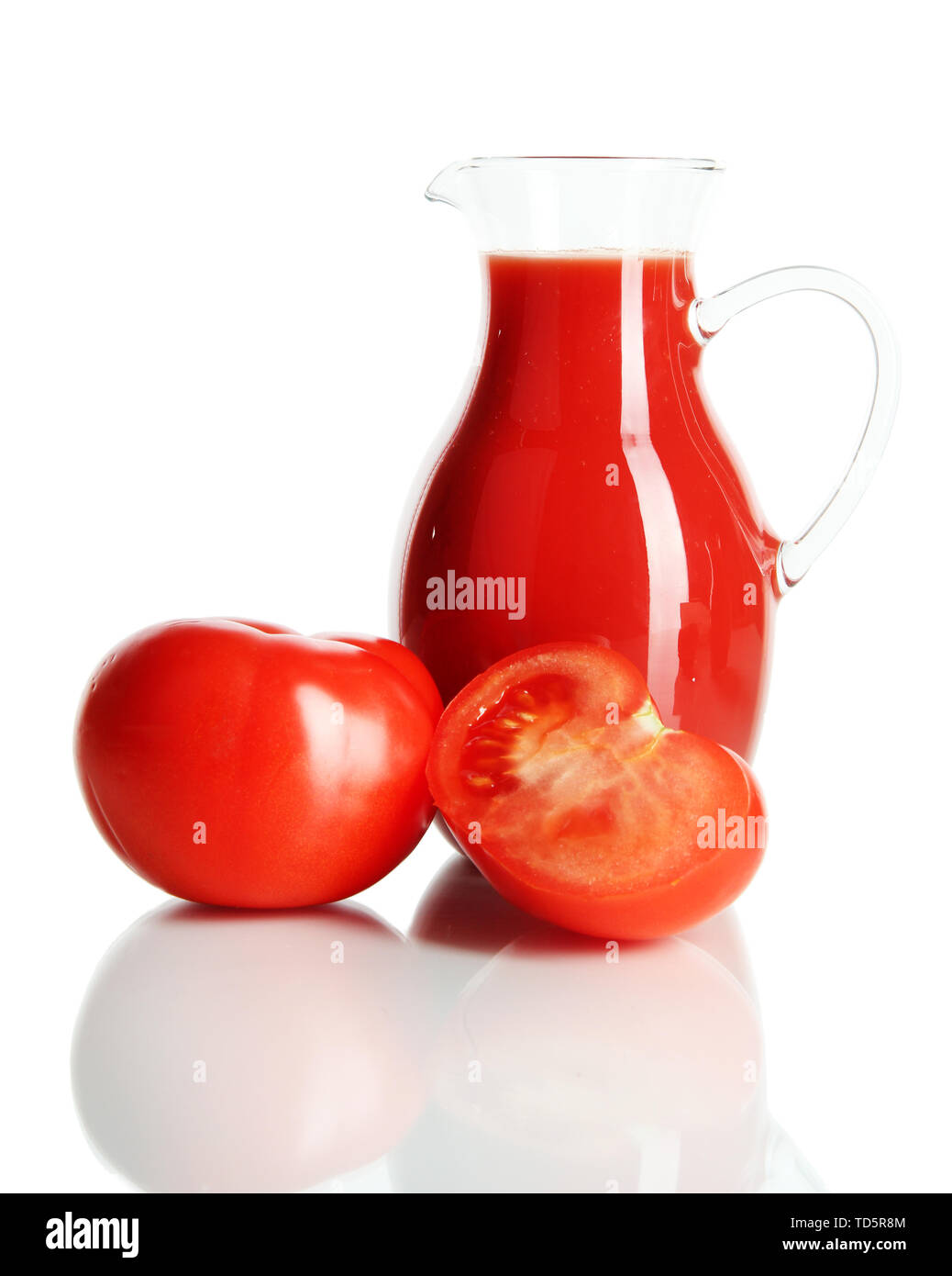 Tomato juice in pitcher isolated on white Stock Photo Alamy