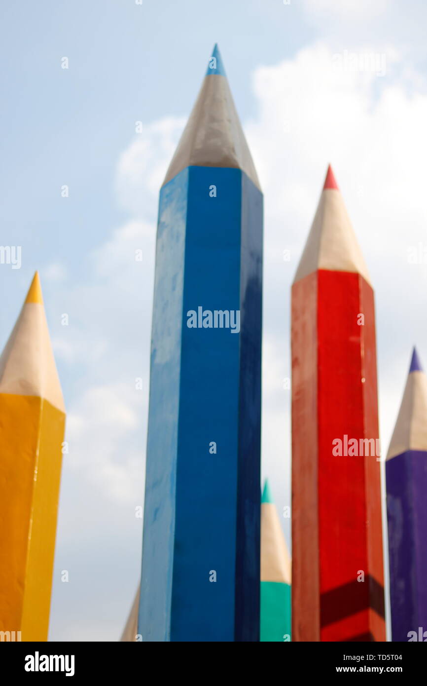 Blue sky pencil crayon building Stock Photo Alamy